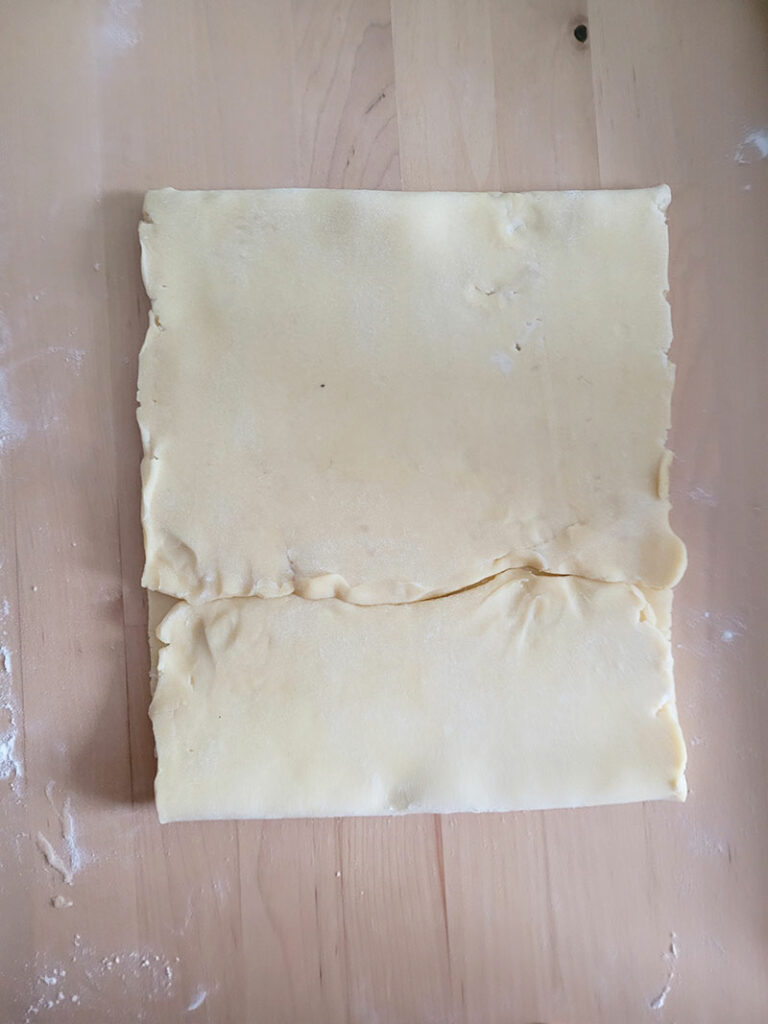 Deuxième pli du tour double